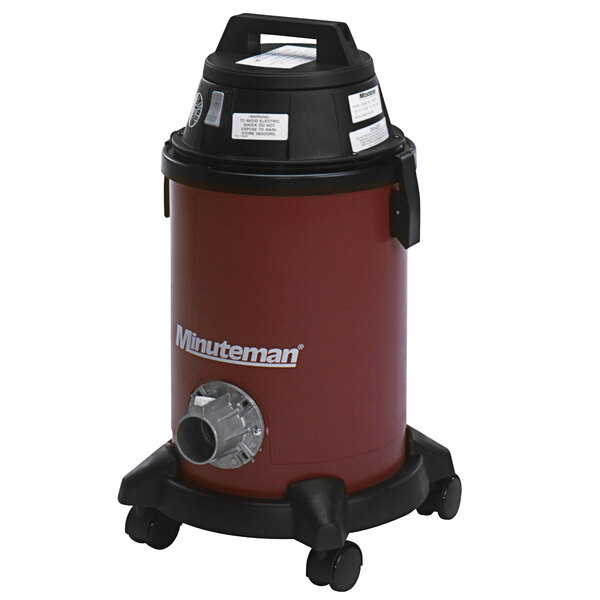 A red and black Minuteman Bio-Haz Vac dry vacuum cleaner on wheels.