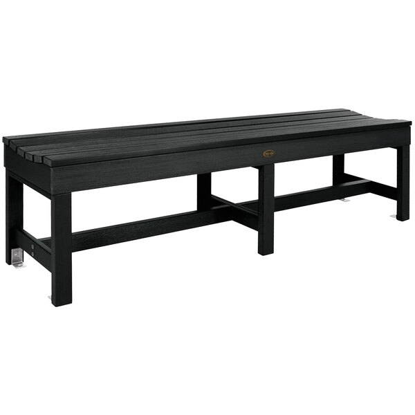 A black backless bench with a faux wood top and black legs.