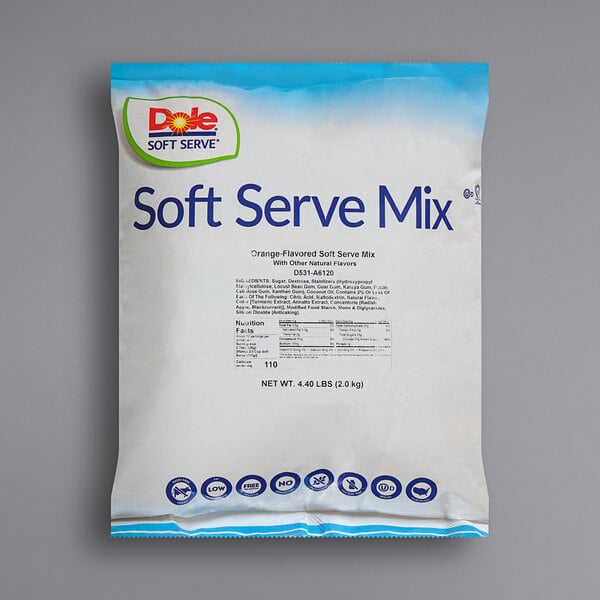 A white bag of DOLE SOFT SERVE Orange Soft Serve Mix with blue text.