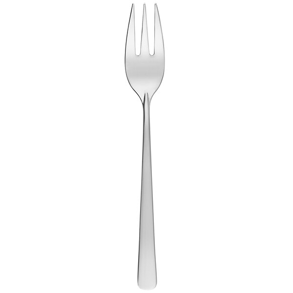 A silver Sola stainless steel cake fork with a white handle.