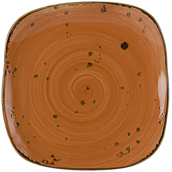 A white square TuxTrendz china plate with a brown and orange swirl design.