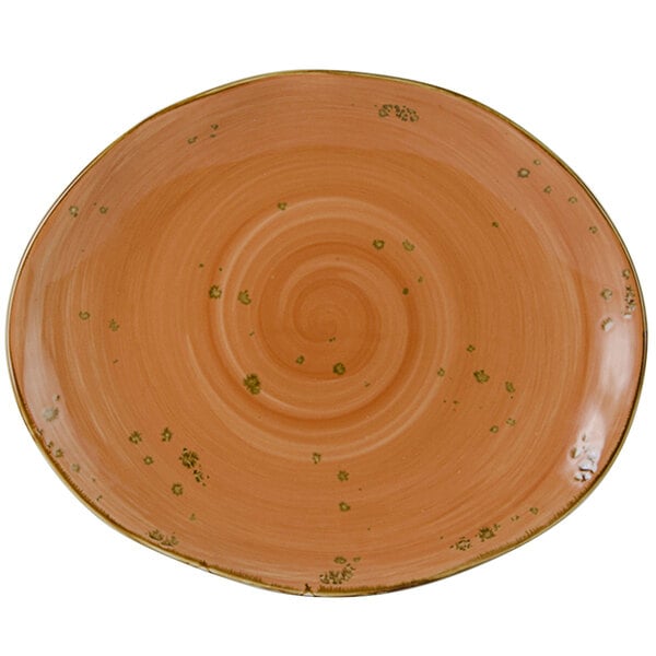 A white Tuxton oval china platter with a coral swirl design and gold dots.