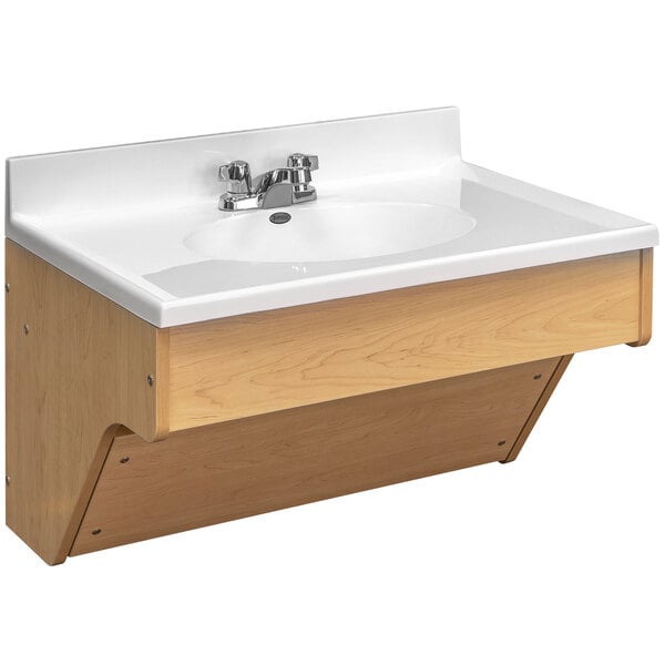 A maple Tot Mate wall vanity with a white sink.