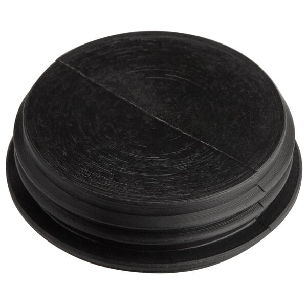 A black plastic plug for American Metalcraft hammered salt and pepper shakers.