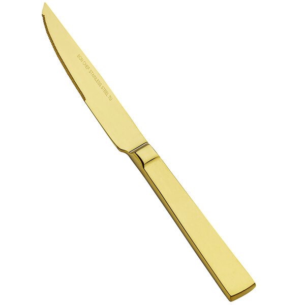 A Bon Chef stainless steel steak knife with a gold handle.