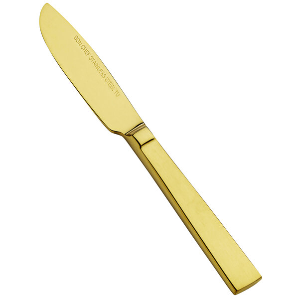 A gold Bon Chef butter knife with a handle and a blade.