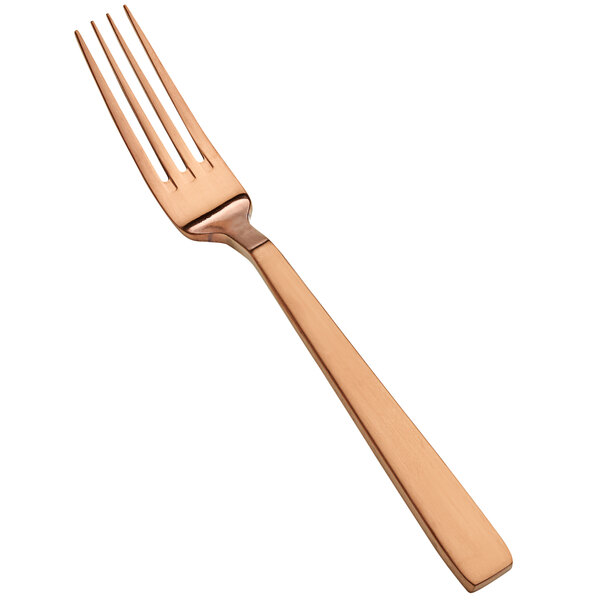 A Bon Chef dinner fork with a rose gold handle.