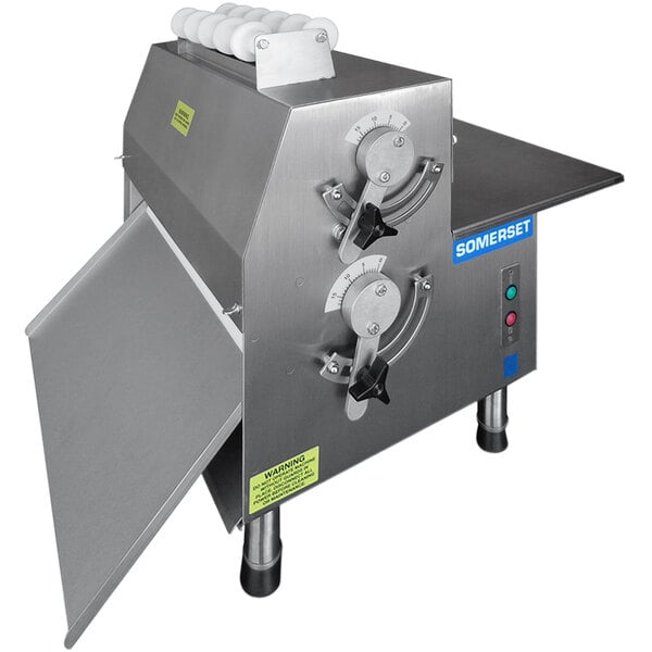 A Somerset dough sheeter with a stainless steel top and side handle.