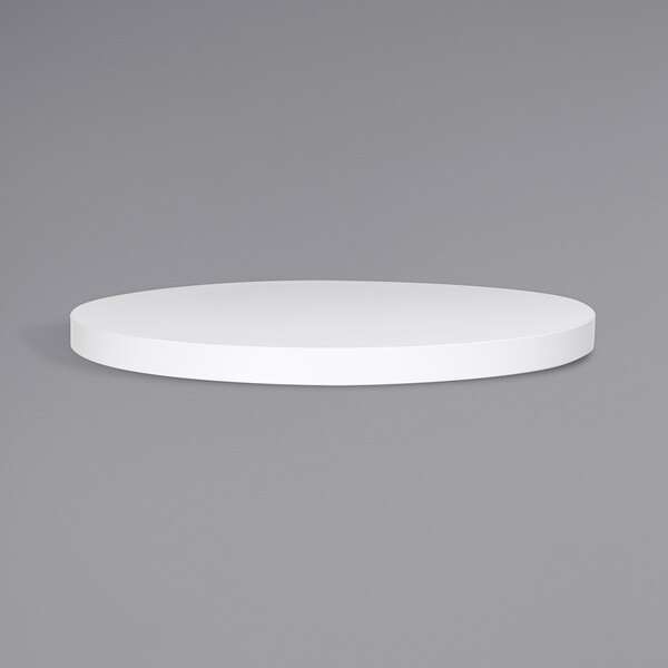 A white round BFM Seating tabletop.