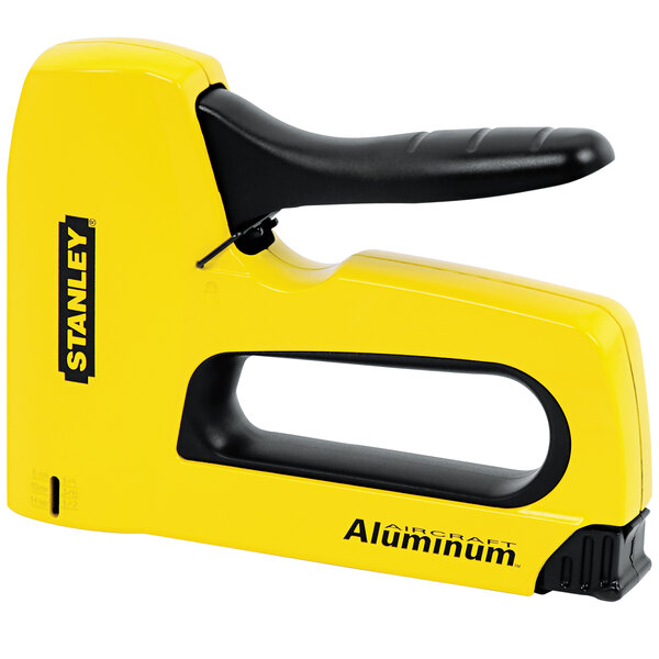 A yellow Stanley SharpShooter staple gun with a black handle.