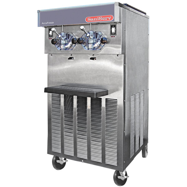 A white SaniServ air cooled commercial ice cream machine with two hoppers.
