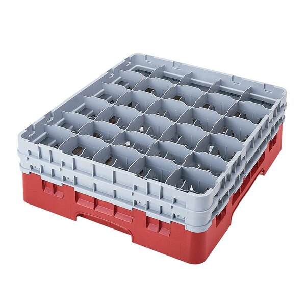 A red and white plastic Cambro glass rack with many compartments.