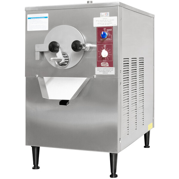 A SaniServ countertop water cooled ice cream batch freezer with a stainless steel base.