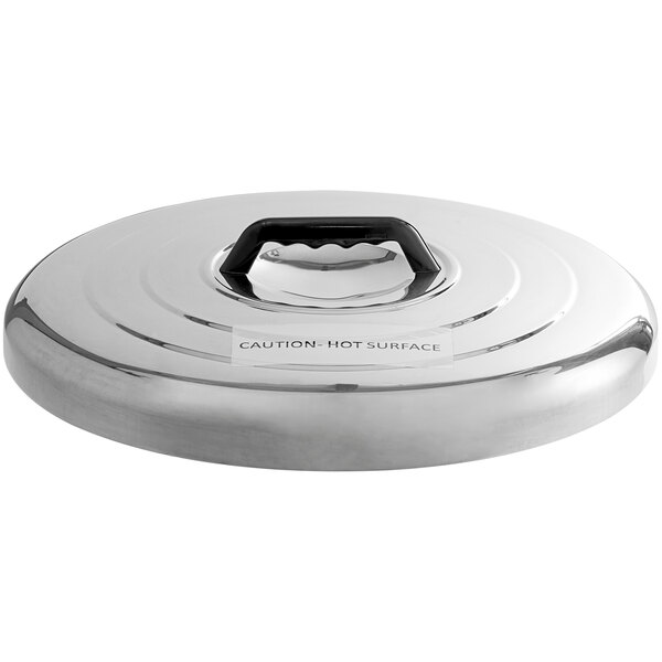 The stainless steel lid for an Emperor's Select gas rice cooker on a counter.