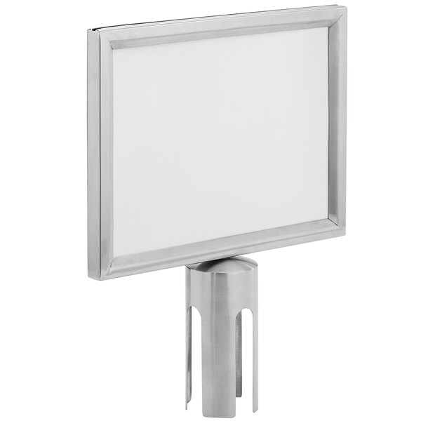 An American Metalcraft silver rectangular frame with a white sign on a metal pole.