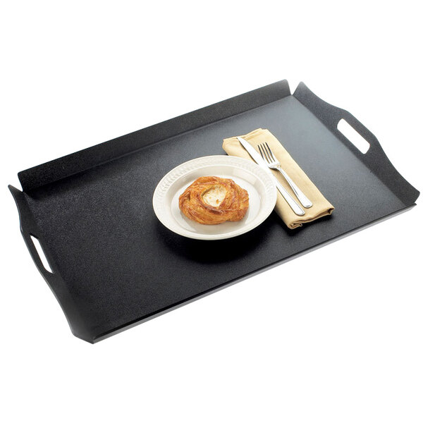 A Cal-Mil black room service tray with a pastry, fork, and knife on it.