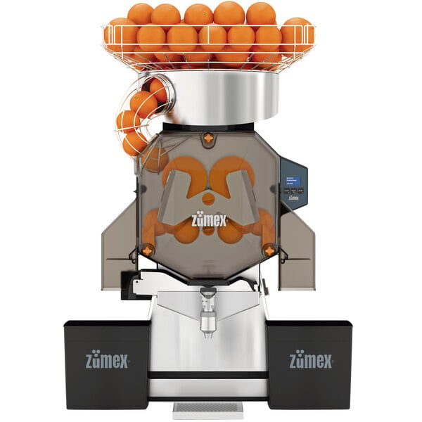 A Zumex Speed S+ juicer with oranges inside.