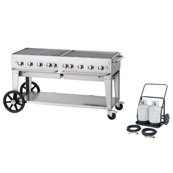 A large stainless steel Crown Verity mobile outdoor charbroiler with a cart and hoses.