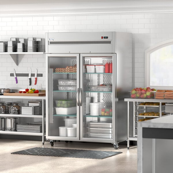 An Avantco stainless steel reach-in refrigerator with glass doors.