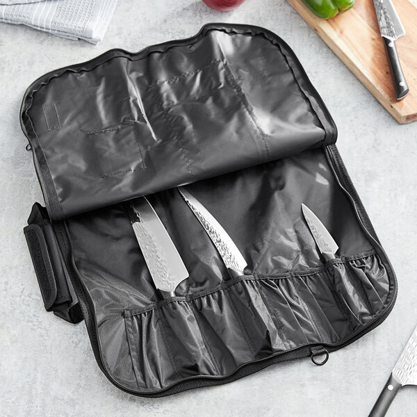 A Kai knife roll with 8 pockets for knives in black.