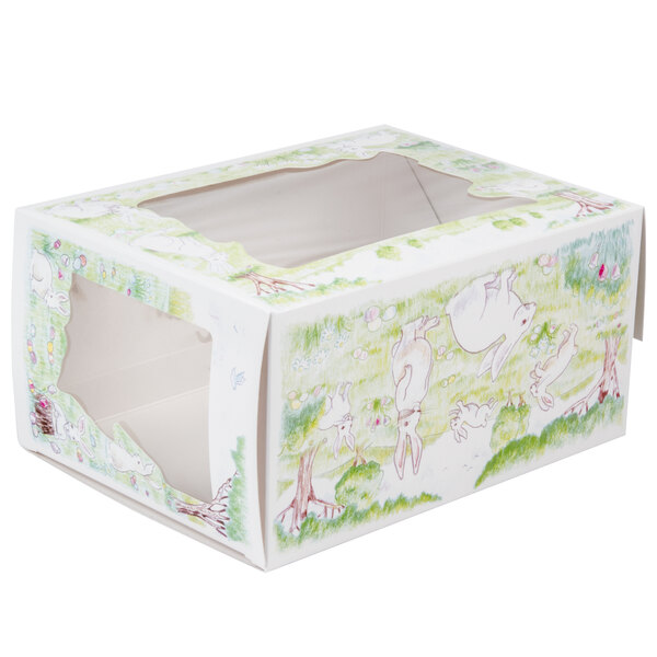 A white window bakery box with an Easter design on the window.