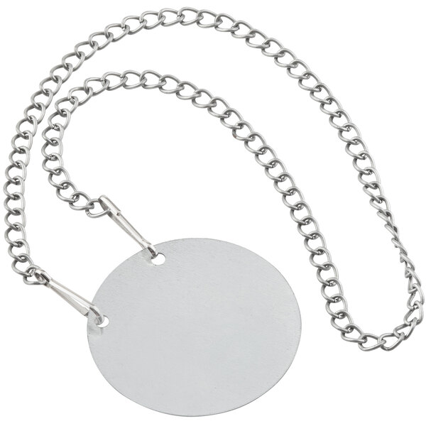 A Tablecraft silver metal circle with a chain attached.