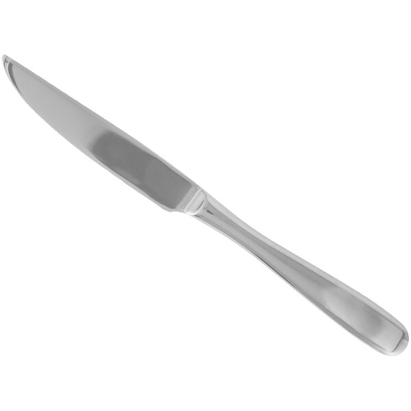 A Walco Vacanza stainless steel steak knife with a silver handle.