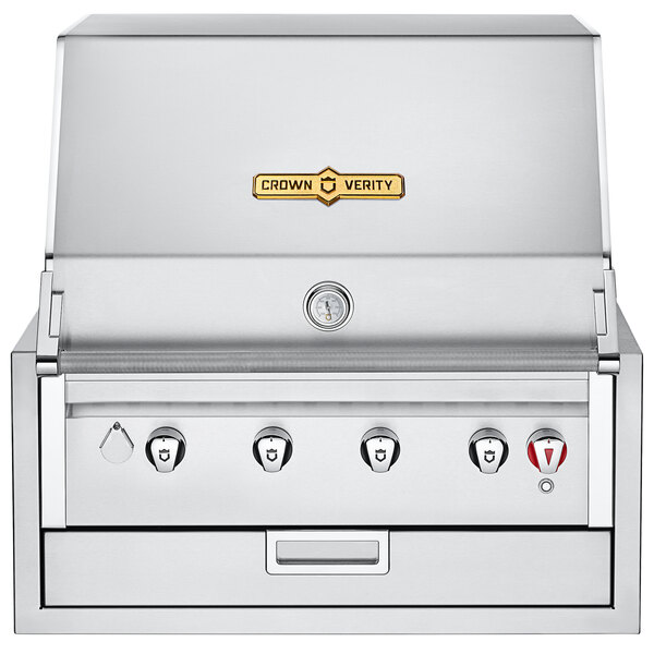A silver Crown Verity built-in grill with three burners and knobs.