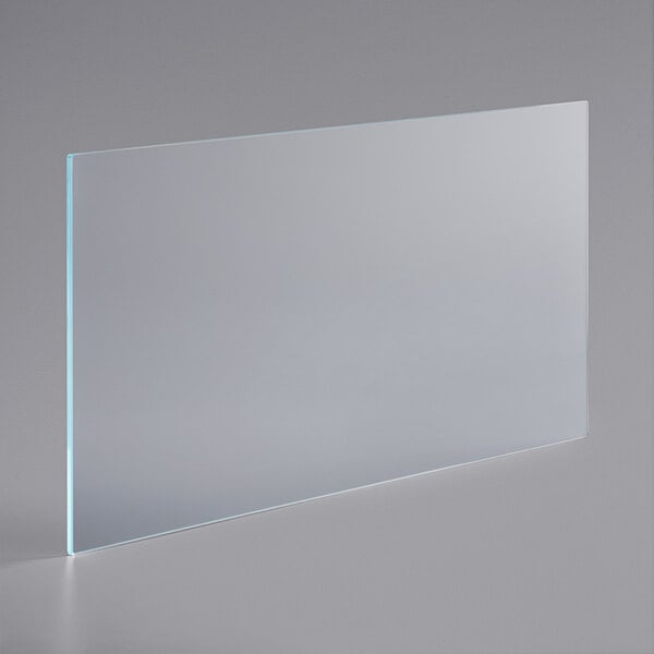 A clear rectangular glass shelf with a clear border.