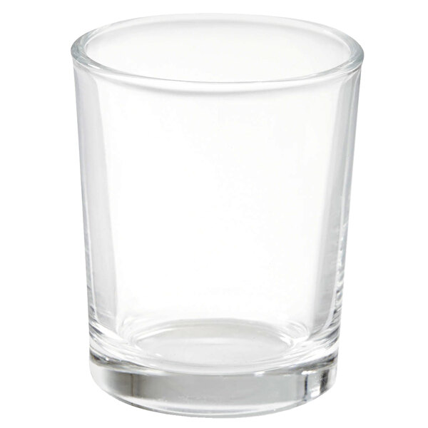 A clear glass container with a white rim.