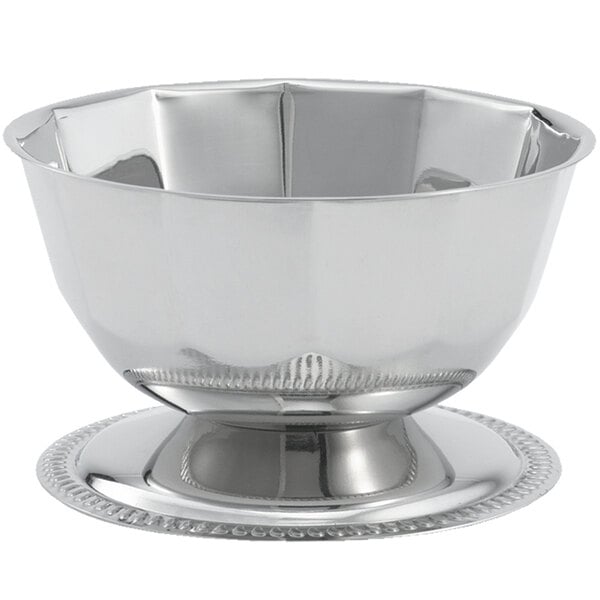 A silver Vollrath Seafood Supreme bowl with a round metal base.