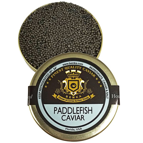 A tin of Bemka Paddlefish Caviar with a label.