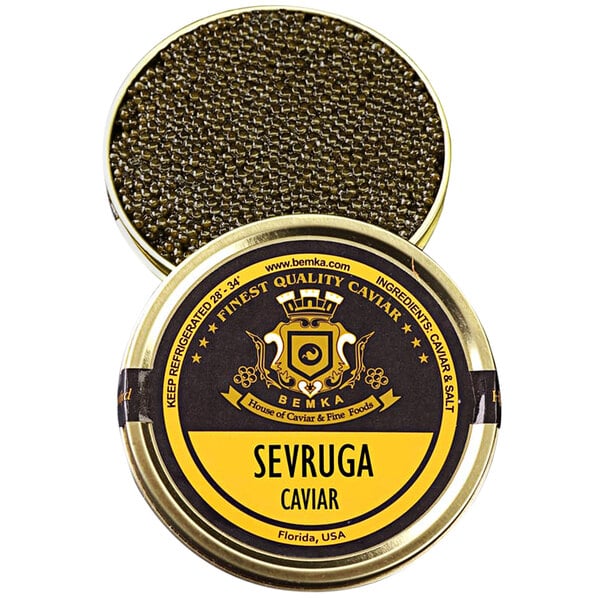 A tin of Bemka Sevruga sturgeon caviar with a yellow label.