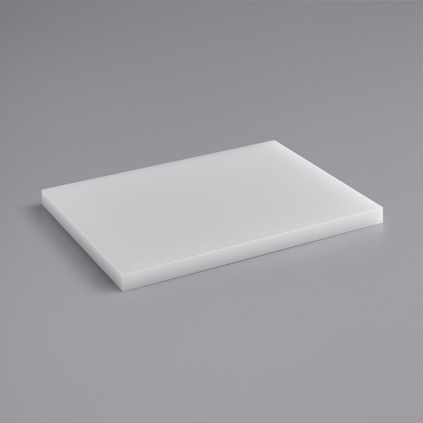 A white rectangular VacPak-It filler plate on a gray surface.