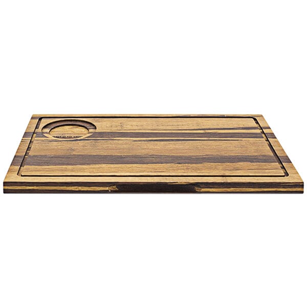 A wooden cutting board with a circle in the middle.