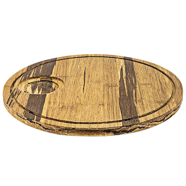 A wooden Front of the House serving board with a circular design and hand grips.