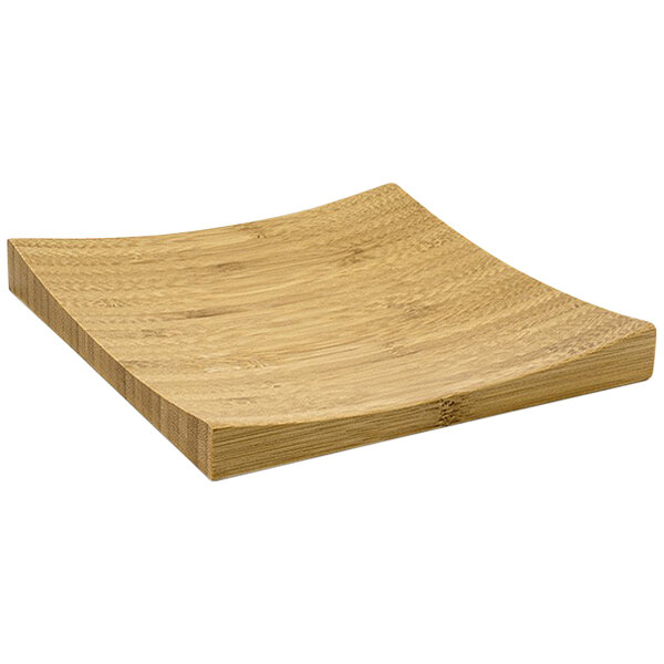 A Front of the House square bamboo plate with a curved edge.