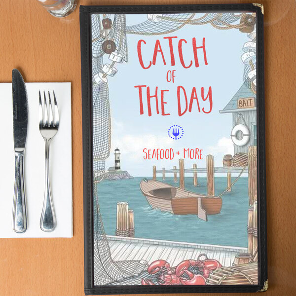 Menu cover with a seafood themed harbor design featuring a boat.