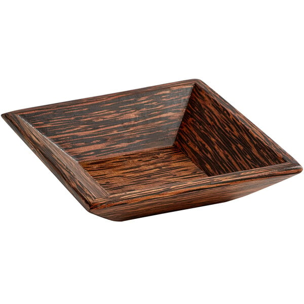 A square wooden plate with a black finish made of palm wood.
