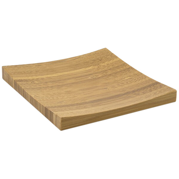 A wooden square plate with a curved edge.