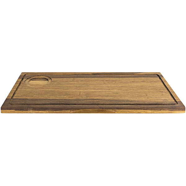 A Front of the House reversible wooden serving board with hand grips.