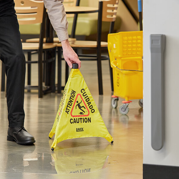 Lavex 20" Caution Wet Floor Pop-Up Sign With Wall-Mounted Case