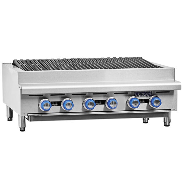 A stainless steel Imperial Range liquid propane countertop charbroiler with blue knobs.