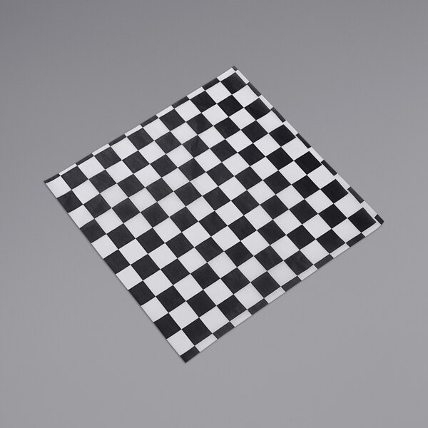 A black and white checkered paper with the American Metalcraft logo.