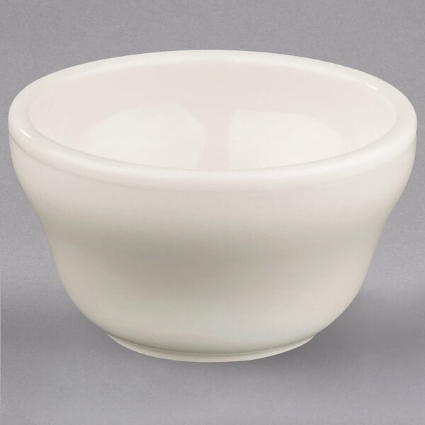 A close up of a Homer Laughlin ivory china bowl.