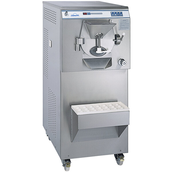 A Carpigiani commercial ice cream batch freezer with a stainless steel container.
