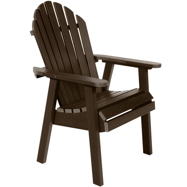 A brown wooden Sequoia Adirondack dining chair with armrests.