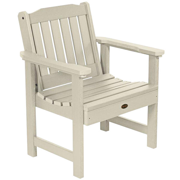 A white Sequoia outdoor arm chair with wooden armrests.