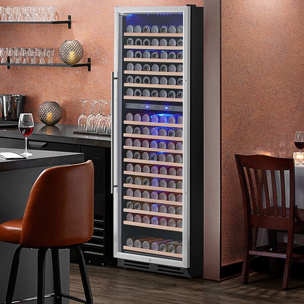 An AvaValley wine cooler in a kitchen with wine glasses in it.