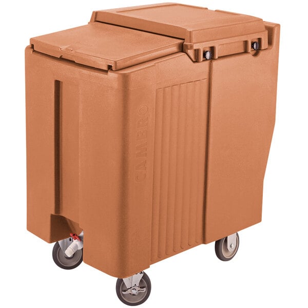 A brown plastic Cambro mobile ice bin with wheels.
